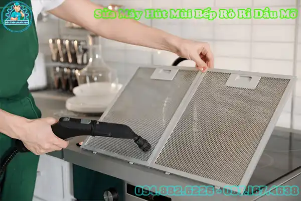 Cách tháo tấm lưới máy hút mùi